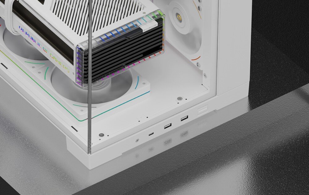 Obudowa THERMALRIGHT A70 zbliżenie na dolną krawędź zmontowanej obudowy komputerowej z panelem zawierającym złącze audio i trzy porty USB oraz widoczną przez szybę masywną kartą graficzną umieszczoną tuż nad dolnymi wentylatorami