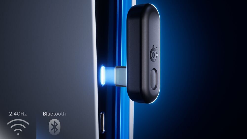 STEELSERIES Arctis Nova 3 USB-C Plug & Play Xbox PlayStation PC Switch kompatybilność, odbiornik na ciemnym tle
