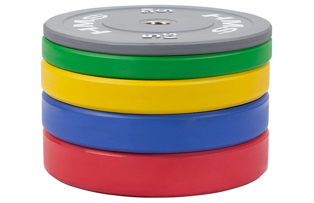 Obciążenie HMS CBR05 (5 kg) białe tło pięć talerz ułożonych na płasko jeden na drugim wewnętrzna tuleja wykonana ze stali nierdzewnej gładka powierzchnia zmniejsza tarcie stalowy element stabilizuje talerz na sztandze, ograniczając luzy