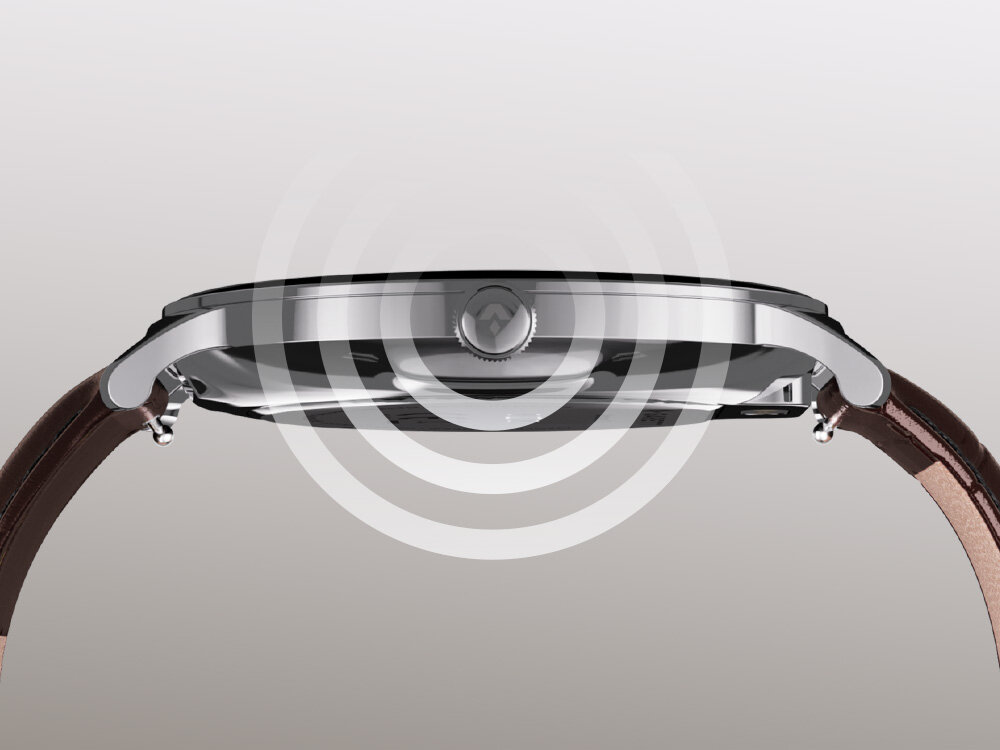 Zbliżenie na bok czarnego smartwatcha z metalową obudową i brązowym paskiem. W tle widoczne są koncentryczne okręgi sugerujące funkcję bezprzewodową.