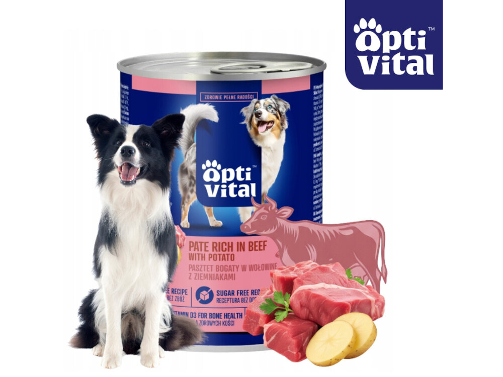 Na obrazie znajduje się puszka karmy dla psa z logo \'opti vital\', obok której stoi pies. Na etykiecie widnieje napis: \'Pasztet bogaty w wołowinę z ziemniakami\'.