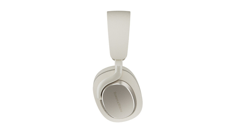 Na zdjęciu widoczne są słuchawki nauszne w jasnym kolorze z napisem \'Bowers & Wilkins\' na nausznicy. Słuchawki mają elegancki, nowoczesny design.