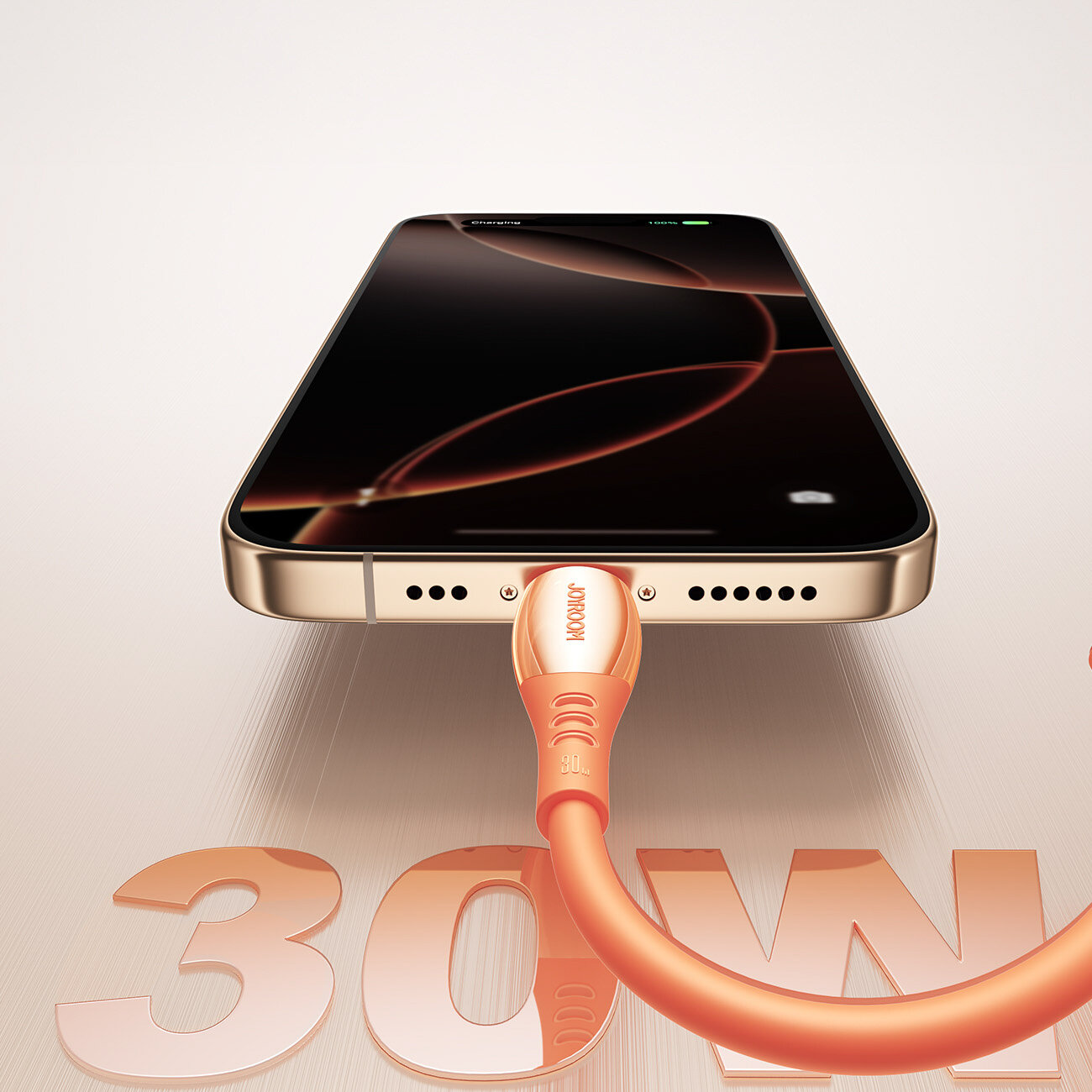 Obraz przedstawia smartfon z podłączonym pomarańczowym kablem do ładowania, na którym widnieje napis \'30W\'.