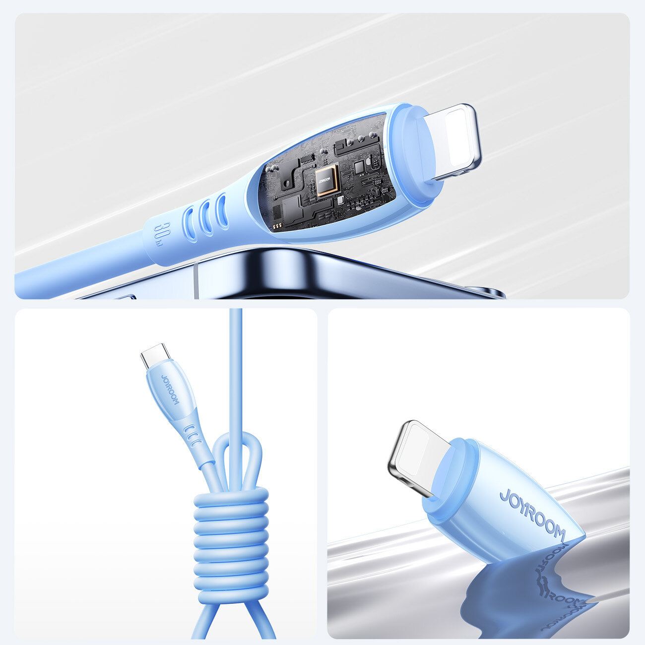 Obraz przedstawia niebieski kabel do ładowania z końcówkami USB-C i Lightning. Na kablu widoczne jest logo \'JOYROOM\'.