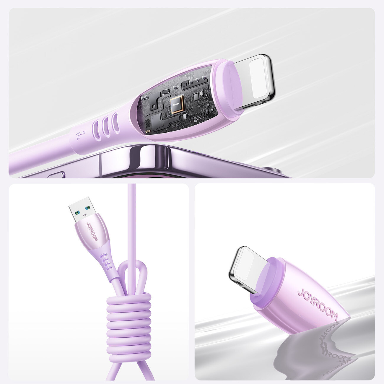 Obraz przedstawia fioletowy kabel USB-A do Lightning z widocznym wnętrzem wtyczki, ukazującym elementy elektroniczne. Na kablu widoczne jest logo \'JOYROOM\'.