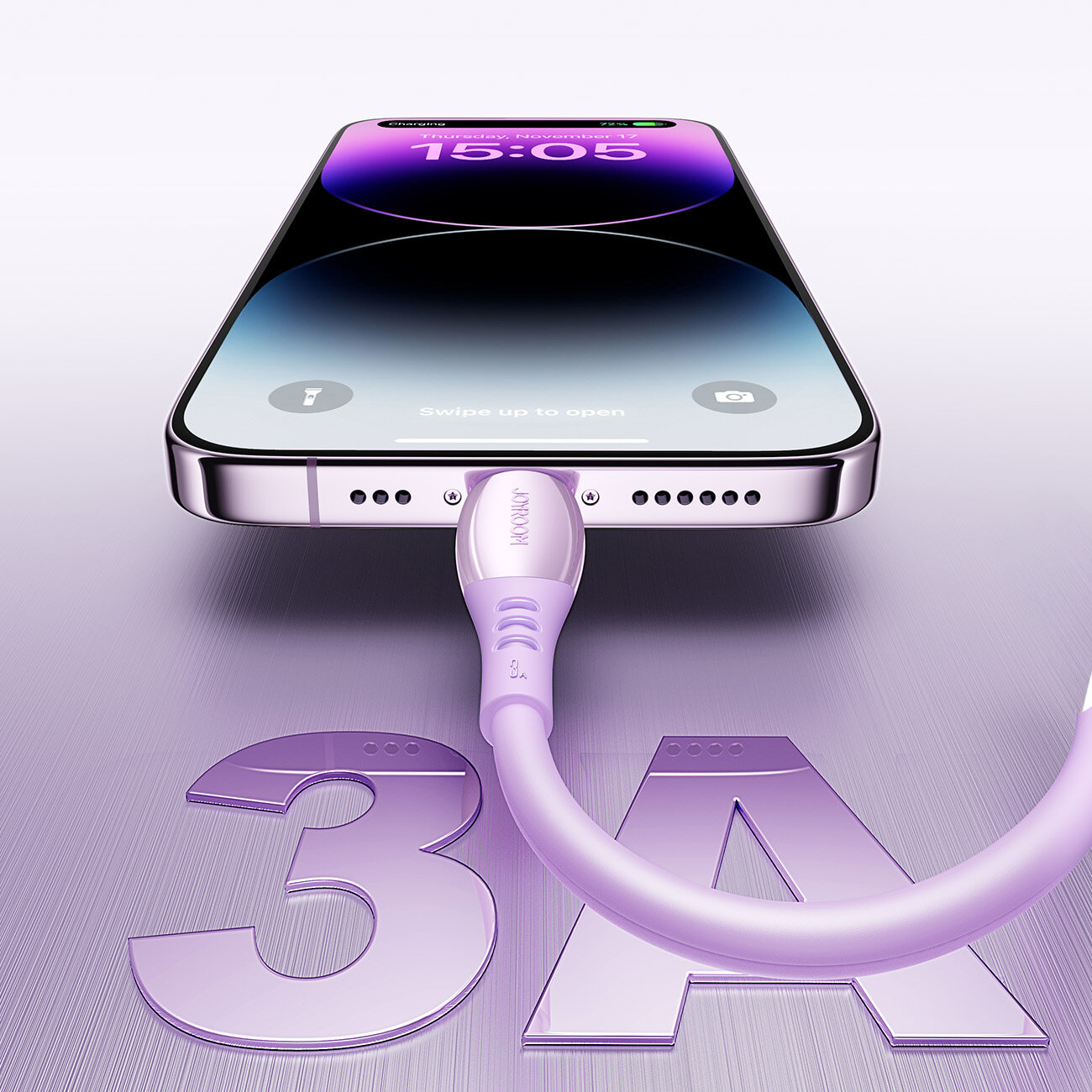 Na obrazie widoczny jest fioletowy kabel USB-A - Lightning podłączony do smartfona, na ekranie którego wyświetla się godzina 15:05. Na powierzchni obok kabla znajduje się duży napis \'3A\'.
