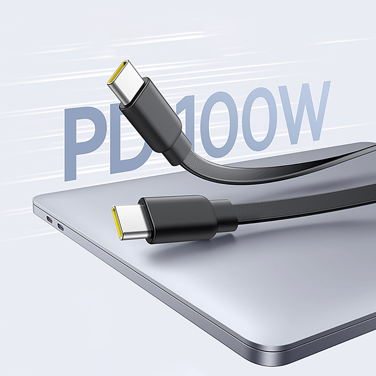 Obraz przedstawia dwa czarne kable USB-C z żółtymi wnętrzami wtyków, leżące na srebrnym urządzeniu elektronicznym. W tle widoczny jest napis \'PD100W\'.