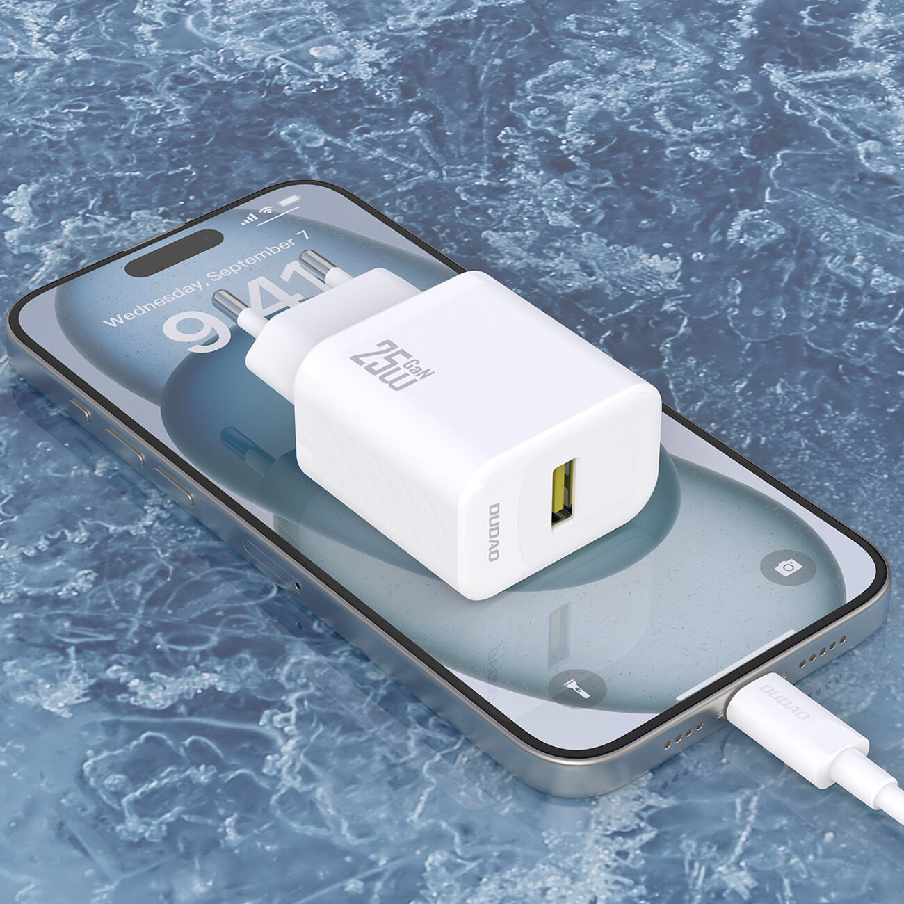 Biała ładowarka Dudao 25W GAN USB-A leży na smartfonie z wyświetlonym ekranem blokady z datą \'Wednesday, September 7\' i godziną \'9:41\'.