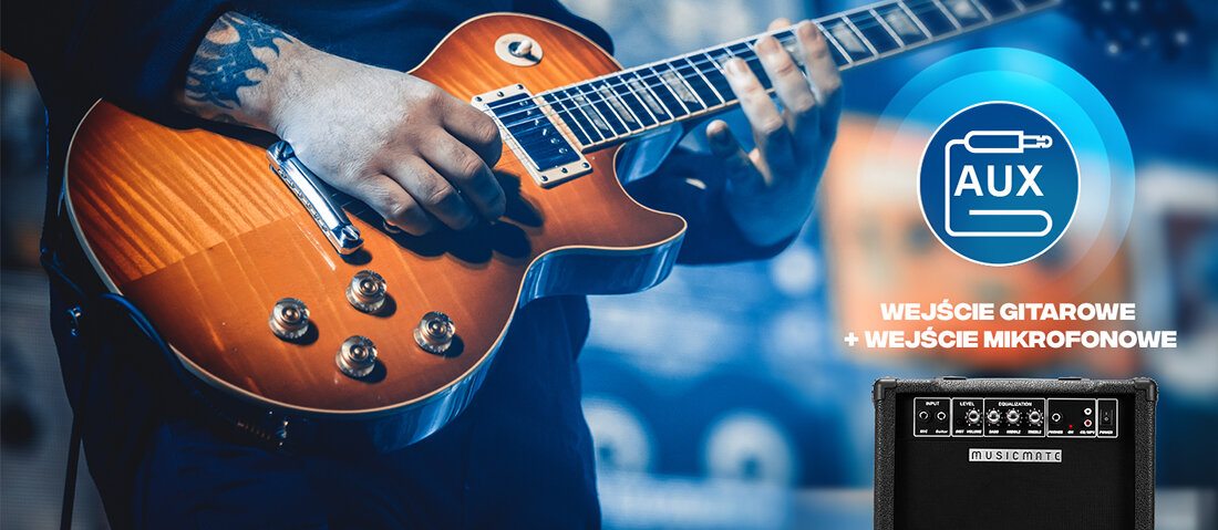 Osoba gra na gitarze elektrycznej o pomarańczowym wykończeniu. Obok znajduje się wzmacniacz z logo \'musicmate\' oraz napis \'WEJŚCIE GITAROWE + WEJŚCIE MIKROFONOWE\'.