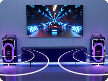 TV in living room displaying gaming scene plays sound via two connected Sound Towers on each side, as shown by soundwaves.