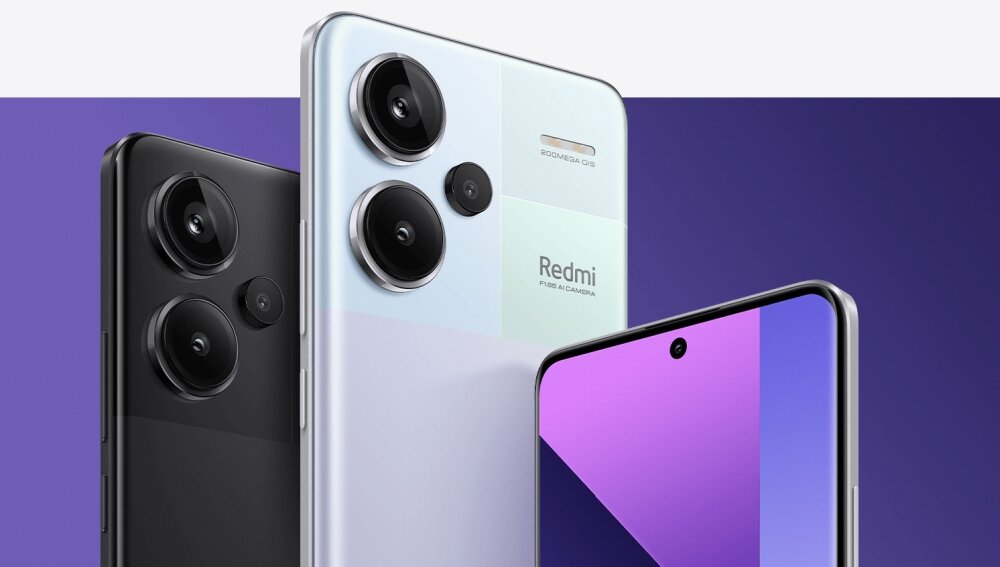 Na obrazie widoczne są dwa smartfony z dużymi aparatami fotograficznymi na tylnej obudowie. Na jednym z urządzeń widnieje napis \'Redmi\' oraz \'200MP OIS\'.