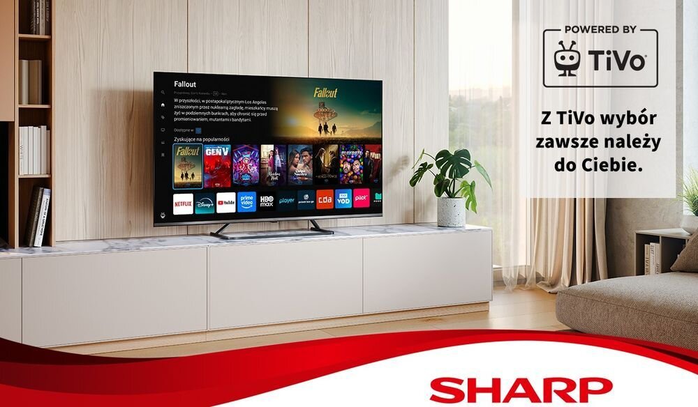 SHARP 55JM6745E inteligentna rozrywka TiVo system Smart TV streaming QLED 4K, telewizor stojący na komodzie w pomieszczeniu