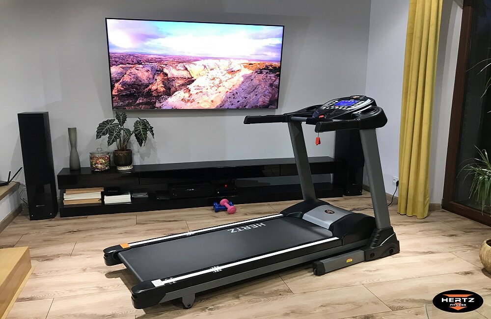 Bieżnia elektryczna HERTZ-FITNESS Speed Impulse Bezgłośna praca system amortyzacji wymiary 12 programów treningowych czytelny ekran LCD