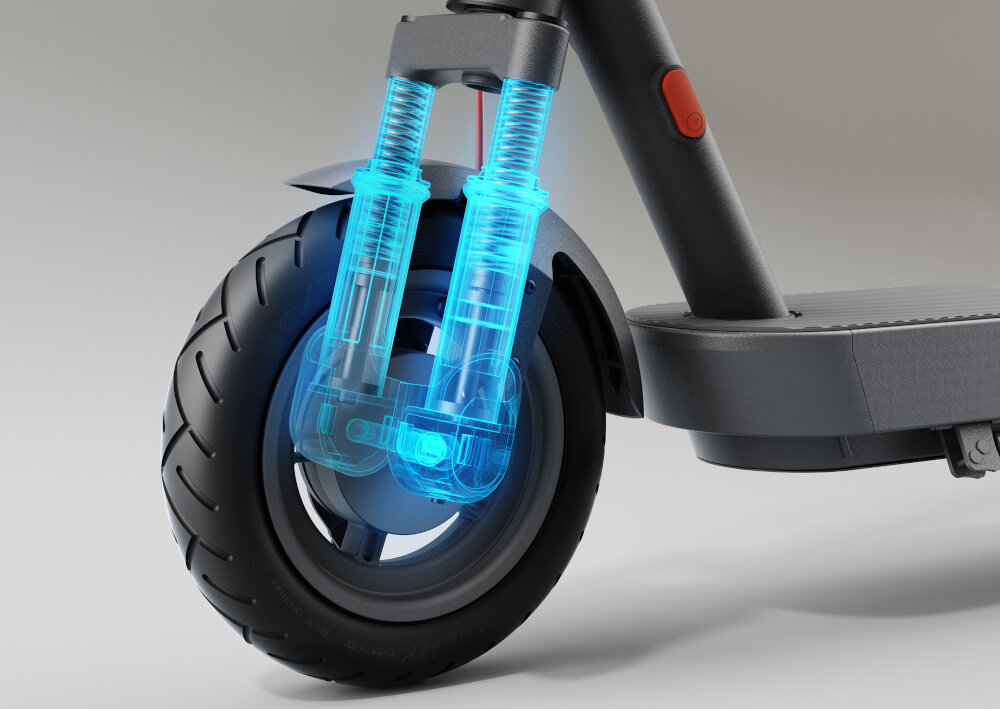 Hulajnoga elektryczna XIAOMI Scooter 5 60 km 350 W 10 cali Czarny zbliżenie na przednie koło podświetlona amortyzacja podwójne sprężynowe zawieszenie z przodu redukuje wpływ wstrząsów i drgań do 30 mm płynna i przyjemna jazda po nierównych terenach amortyzacja