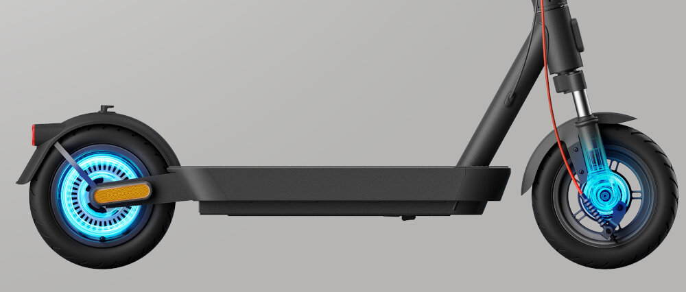 Hulajnoga elektryczna XIAOMI Scooter 5 60 km 350 W 10 cali Czarny zbliżenie na koła podświetlone hamulce w przednim i tylnym kole bezpieczeństwo podwójny system hamulcowy przedni hamulec bębnowy tylny system E-ABS duża siła hamowania system E-ABS zapobiega blokowaniu się kół podczas hamowania