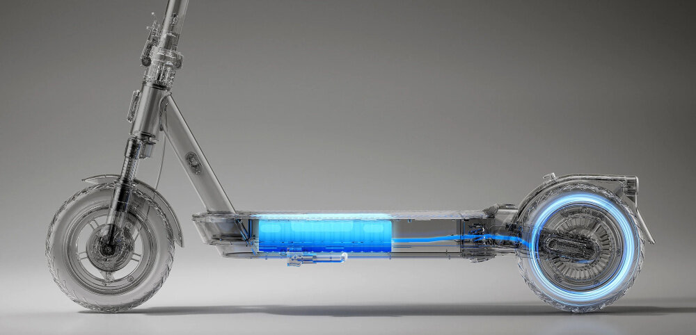 Hulajnoga elektryczna XIAOMI Scooter 5 Pro 60km 400W 10 cali Czarny zbliżenie na baterie w podeście podświetlona bateria wydajna bateria litowo-jonowa 10,2 Ah 477 Wh / 36 V zasięg do 60 km czas ładowania około 9 godzin maksymalna prędkość do 20 km/h