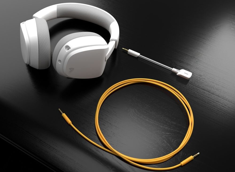 GLORIOUS GHS Eternal GLO-A-1PC-BLK słuchawki THD 1 procent czysty dźwięk stabilne parametry audio gaming, słuchawki leżące na biurku wraz z kablem Aux