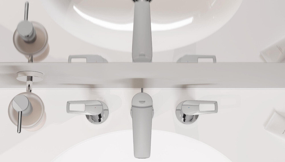 DOZOWNIK GROHE ESSENTIALS 40394001 CHROM Widok z góry na umywalkę z baterią i dwoma pokrętłami ściennymi oraz akcesoriami po bokach, tworzący symetryczny układ elegancki wygląd staranne wykończenie styl design w łazience