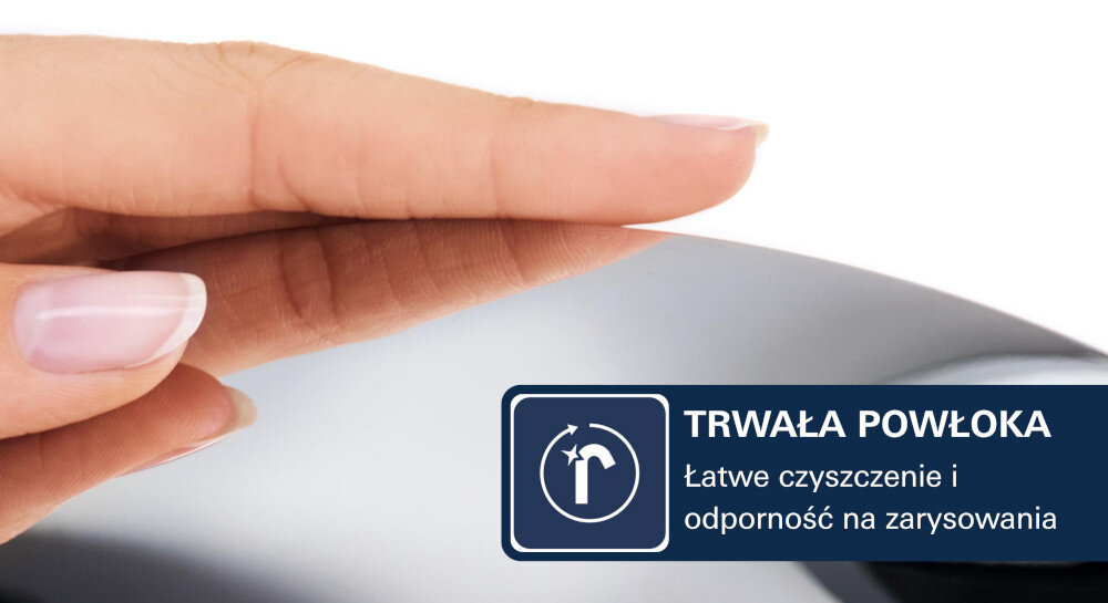 Dłoń dotyka gładkiej, metalicznej powierzchni. Obok znajduje się napis: \'TRWAŁA POWŁOKA Łatwe czyszczenie i odporność na zarysowania\'.