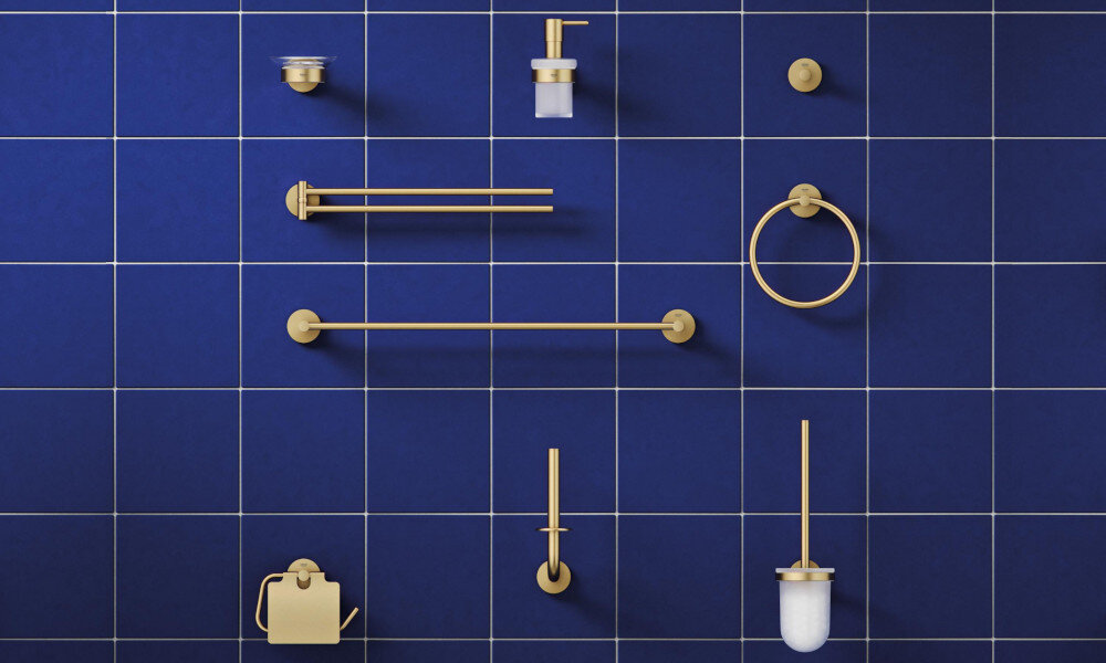 HACZYK NA PŁASZCZ KĄPIELOWY GROHE ESSENTIALS 40364GN1 Miedź szczotkowana Zestaw akcesoriów łazienkowych zamocowanych na ścianie z jasnych płytek obejmuje m.in. uchwyt na ręczniki, dozownik i uchwyt na papier toaletowy. Elementy mają spójny, ciemny kolor i prosty design dopasowane akcesoria spójność wnętrza kompletacja łazienki