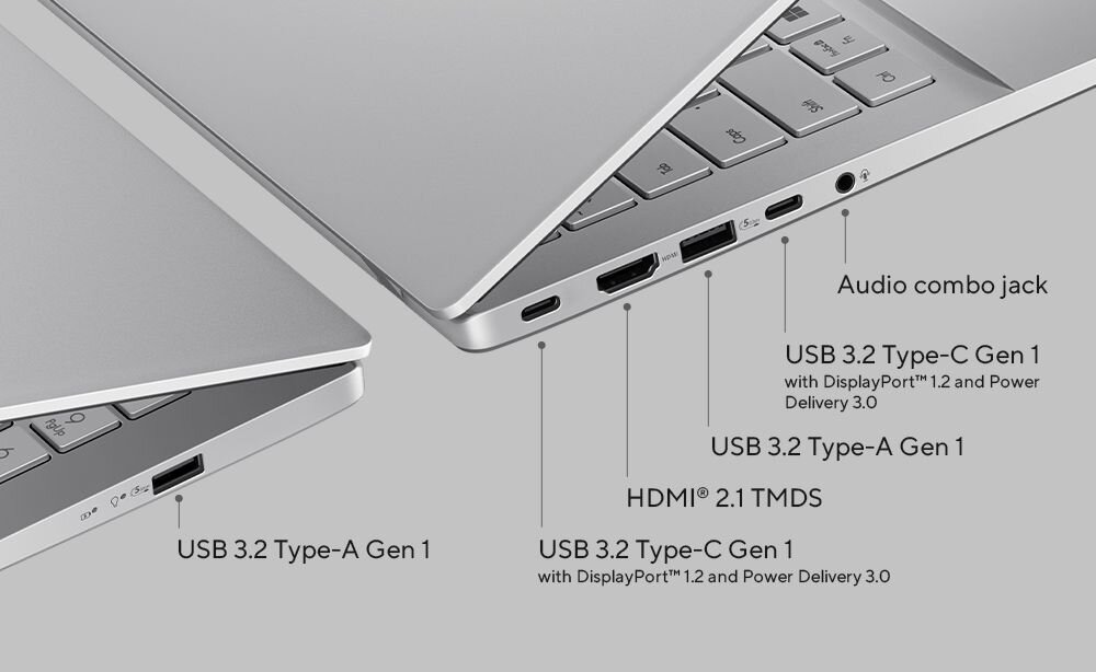 Obraz przedstawia dwa laptopy z widocznymi portami: USB 3.2 Type-A Gen 1, HDMI 2.1 TMDS, USB 3.2 Type-C Gen 1 z DisplayPort 1.2 i Power Delivery 3.0 oraz gniazdo audio combo jack. Laptopy są w kolorze srebrnym, a na klawiaturze widać klawisze funkcyjne.