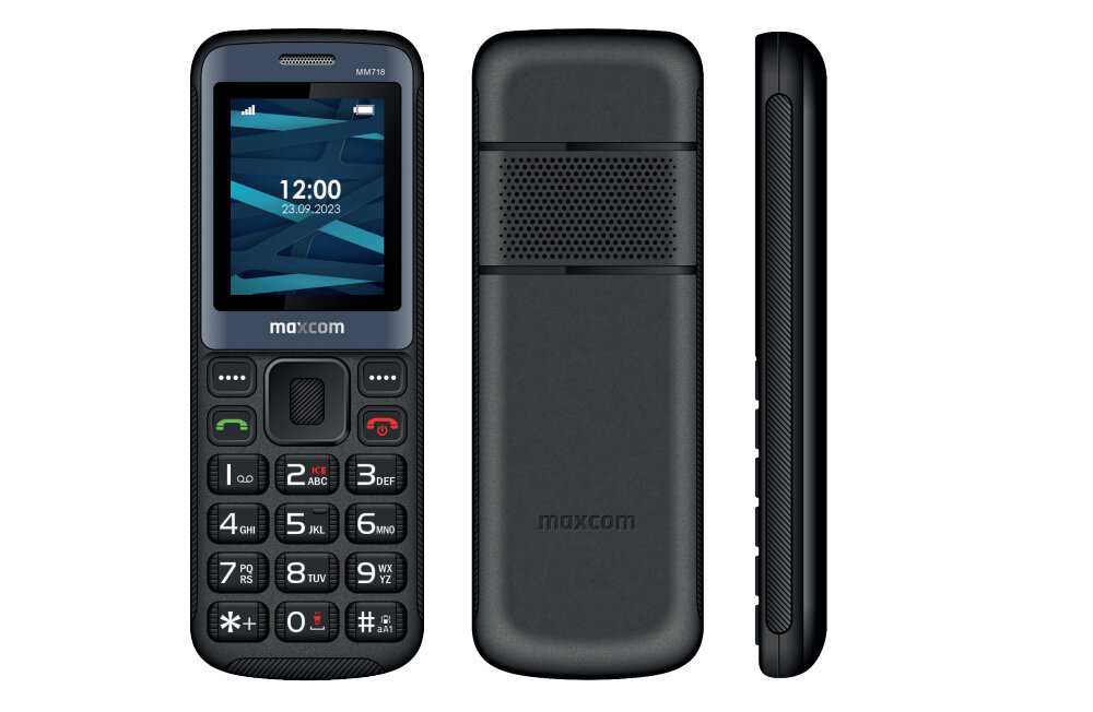 Na obrazie widoczny jest czarny telefon komórkowy z dużymi przyciskami i wyświetlaczem pokazującym godzinę 12:00 oraz datę 23.09.2023. Na obudowie telefonu znajduje się logo \'maxcom\'.