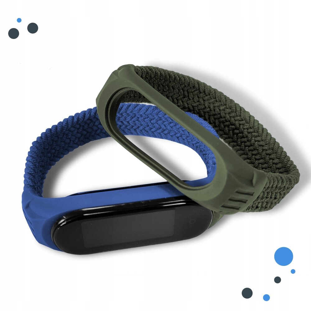 Dwa kolorowe paski do smartband\'a, jeden niebieski z czarnym ekranem, drugi zielony z plecionym wzorem. W tle widoczne są niebieskie i czarne kropki dekoracyjne.