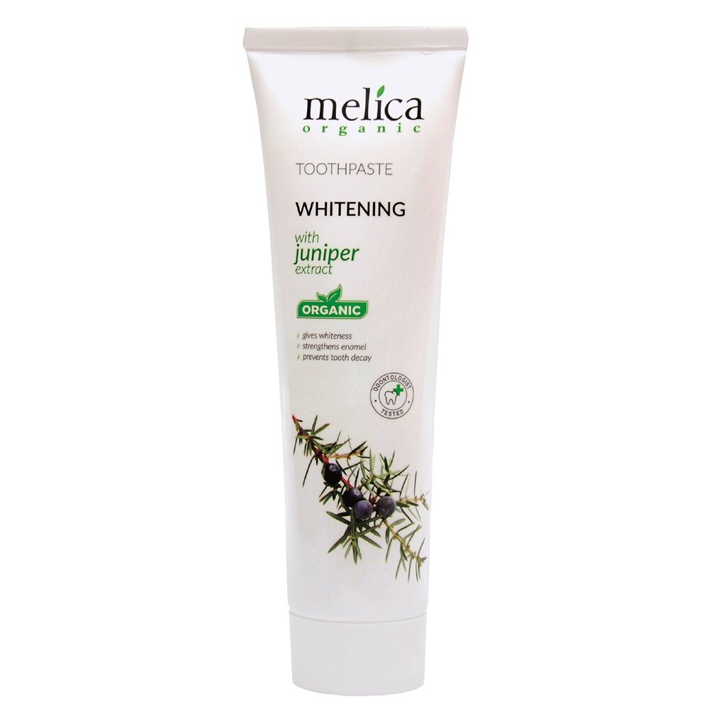 Biała tubka pasty do zębów z napisem \'melica organic TOOTHPASTE WHITENING with juniper extract ORGANIC\'. Na tubce widoczna jest grafika gałązki jałowca z owocami.