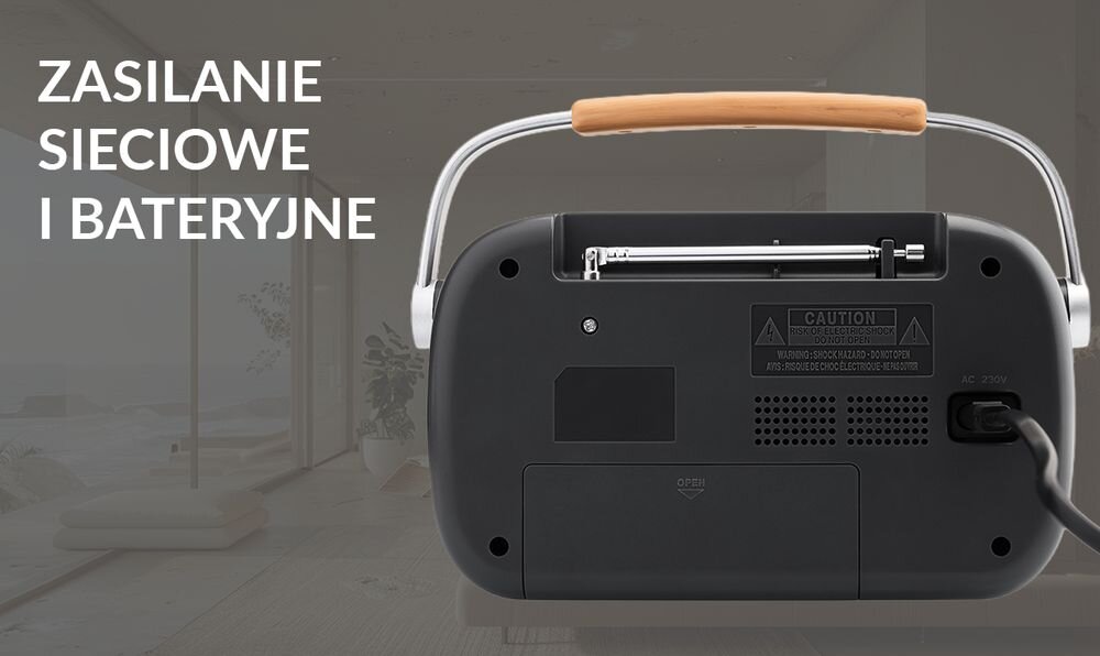 JVC RA-E215G radio FM zasilanie sieciowe baterie D głośnik 2W przewód zasilający, tył radia na tle pomieszczenia