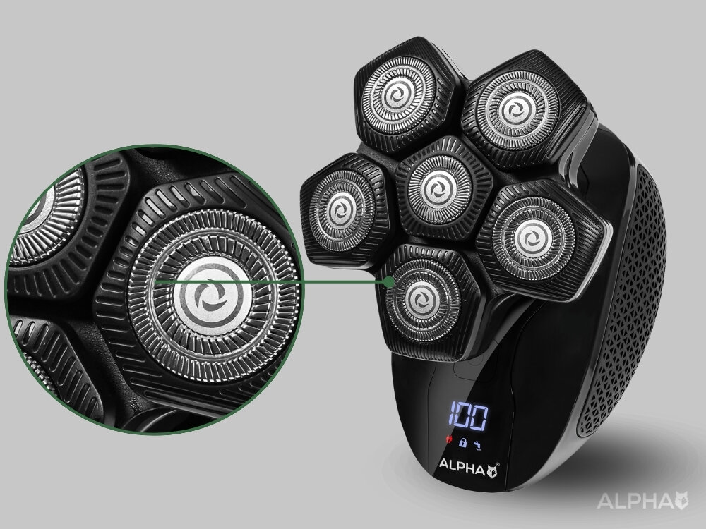 Golarka z sześcioma okrągłymi głowicami tnącymi, zbliżenie na jedną z głowic. Na obudowie widoczny jest wyświetlacz z liczbą \'100\' oraz logo \'ALPHA\'.