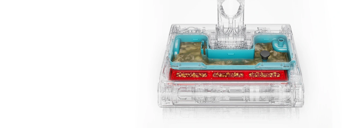 Przekrój elektroszczotki z widocznym zbiornikiem na suche zanieczyszczenia oraz osobnym zbiornikiem na brudną wodę