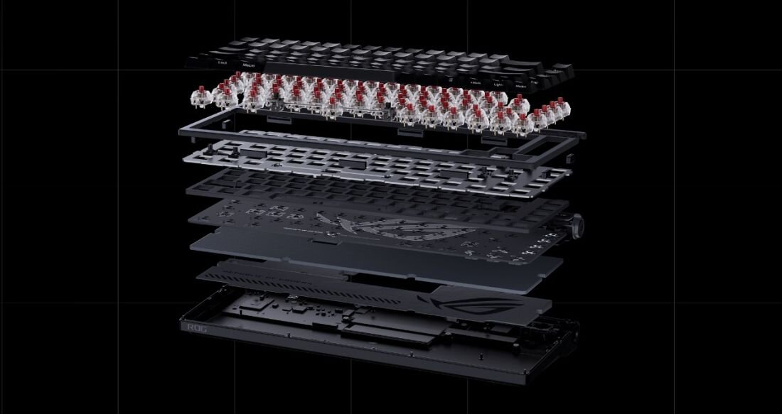 Obraz przedstawia rozłożony na części model klawiatury, ukazujący różne warstwy konstrukcji. Widoczne są klawisze, przełączniki mechaniczne oraz obudowa z logo producenta.