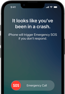 Ekran smartfona z komunikatem: \'It looks like you\'ve been in a crash. iPhone will trigger Emergency SOS if you don\'t respond.\' Widoczny jest przycisk \'SOS Emergency Call\'.