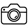 Ikona przedstawiająca czarny kontur aparatu fotograficznego na białym tle.