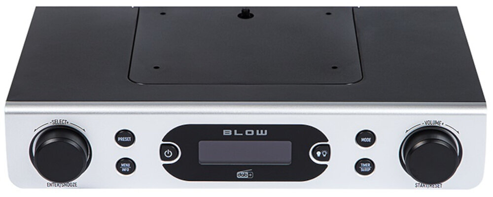 Srebrne przenośne radio z czarnym panelem i wyświetlaczem LCD. Na panelu widoczne są przyciski funkcyjne oraz pokrętła z oznaczeniami \'SELECT\' i \'VOLUME\'.