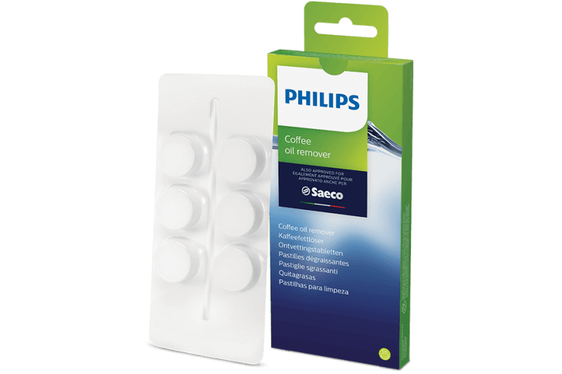 Opakowanie tabletek do usuwania oleju kawowego marki PHILIPS z logo Saeco. Obok znajduje się blister z sześcioma białymi tabletkami.