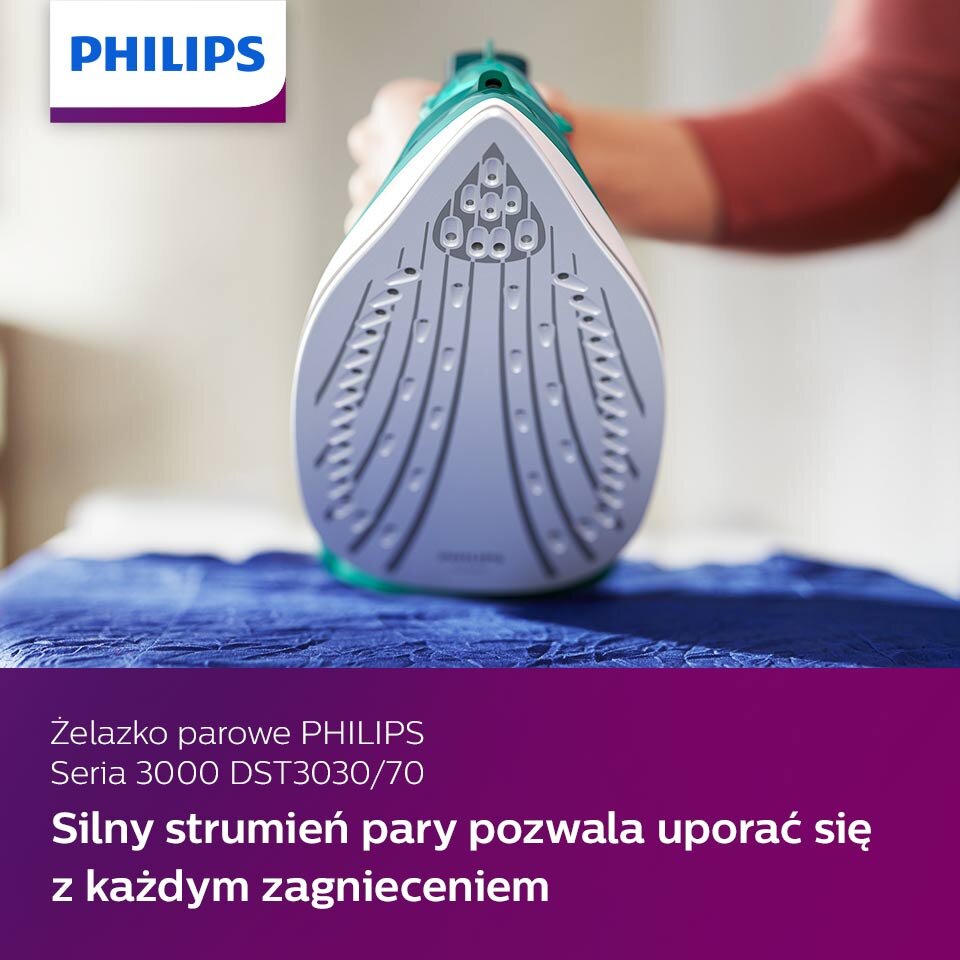 Zdjęcie przedstawia żelazko parowe z widoczną stopą, trzymane przez osobę. Na dole znajduje się tekst: \'Żelazko parowe PHILIPS Seria 3000 DST3030/70 Silny strumień pary pozwala uporać się z każdym zagnieceniem\'.