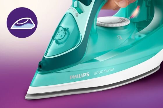 Zdjęcie przedstawia żelazko w kolorze turkusowym z widocznym logo PHILIPS i napisem 3000 Series. Obok żelazka znajduje się ikona przedstawiająca symbol żelazka na fioletowym tle.