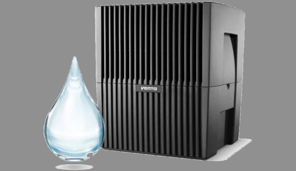 Czarny nawilżacz powietrza z pionowymi żebrami i logo \'venta\' na środku. Obok urządzenia znajduje się duża kropla wody.