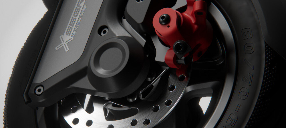 Hulajnoga elektryczna SEGWAY Ninebot F3 Pro D 70km 1200W Amortyzacja 10 cali Czarny zbliżenie na hamulec przedni hamulec tarczowy mechaniczny tylny elektromagnetyczny bardzo duża siła hamowania wbudowany system TCS system kontroli trakcji utrzymanie większej stabilności podczas jazdy na śliskiej i mokrej drodze