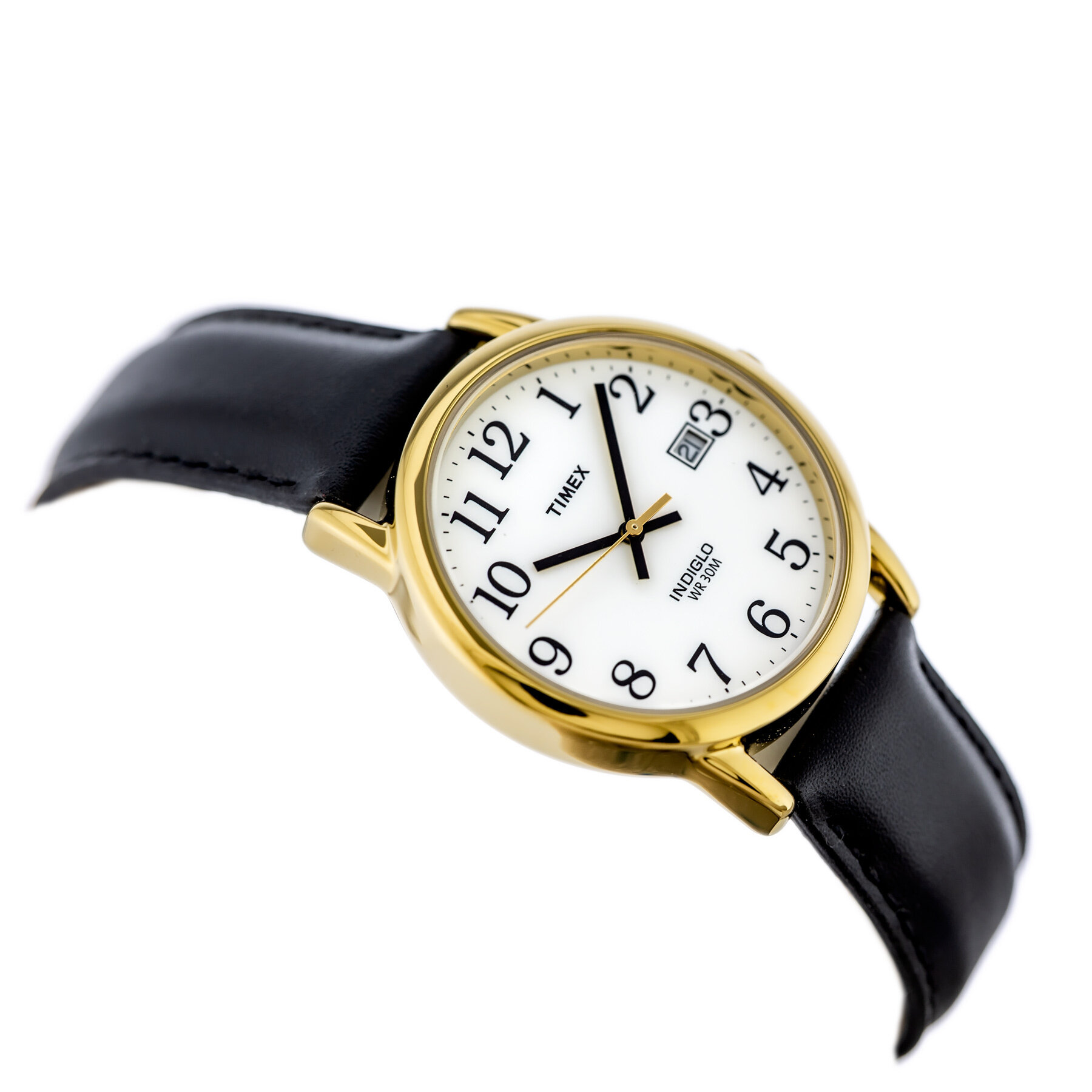 Zegarek z okrągłą, złotą kopertą i białą tarczą z czarnymi cyframi arabskimi. Na tarczy widoczne są napisy: \'TIMEX\', \'INDIGLO\', \'WR 30M\' oraz okienko datownika.