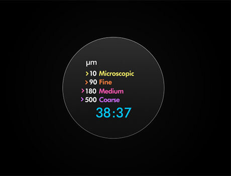 Na czarnym tle znajduje się okrąg z tekstem: \'>10 Microscopic, >90 Fine, >180 Medium, >500 Coarse\' oraz liczba \'38:37\' w kolorze niebieskim.