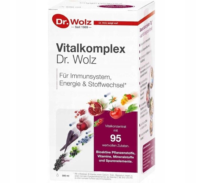 Opakowanie produktu Vitalkomplex Dr. Wolz z grafiką owoców i warzyw oraz tekstem: \'Für Immunsystem, Energie & Stoffwechsel\'. Widoczny jest również napis \'Vitalkonzentrat mit 95 wertvollen Zutaten\'.