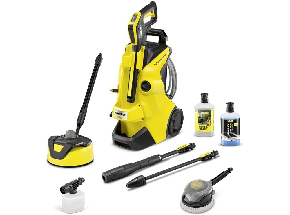 Na zdjęciu znajduje się żółta myjka ciśnieniowa z różnymi akcesoriami, w tym butelkami z płynami. Widoczne jest logo KARCHER na urządzeniu.