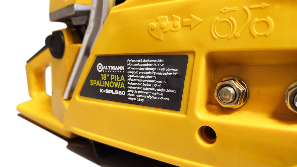 Żółta piła spalinowa z widoczną tabliczką informacyjną. Na tabliczce napisano: \'KALTMANN 18\