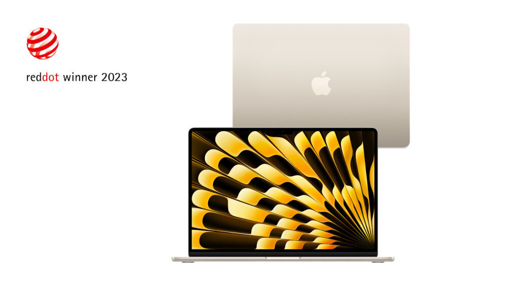 Na obrazie widoczny jest laptop z wyświetlaczem prezentującym abstrakcyjny wzór w kolorach żółtym i czarnym. Obok znajduje się logo \'APPLE\' oraz napis \'reddot winner 2023\'.