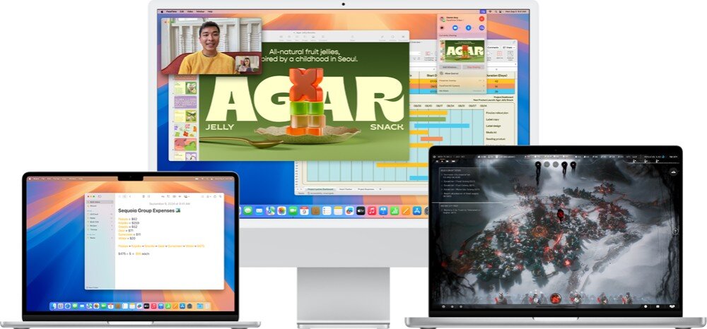 Na obrazie widoczne są trzy komputery marki APPLE z różnymi ekranami. Na ekranach znajdują się aplikacje, w tym wideokonferencja, prezentacja graficzna oraz gra komputerowa.