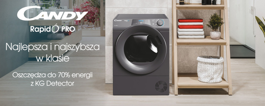 Na obrazie widoczna jest suszarka CANDY RapidO Pro w nowoczesnym wnętrzu. Obok suszarki znajduje się półka z ręcznikami i rośliną, a na ścianie widnieje tekst: \'Najlepsza i najszybsza w klasie. Oszczędza do 70% energii z KG Detector\'.