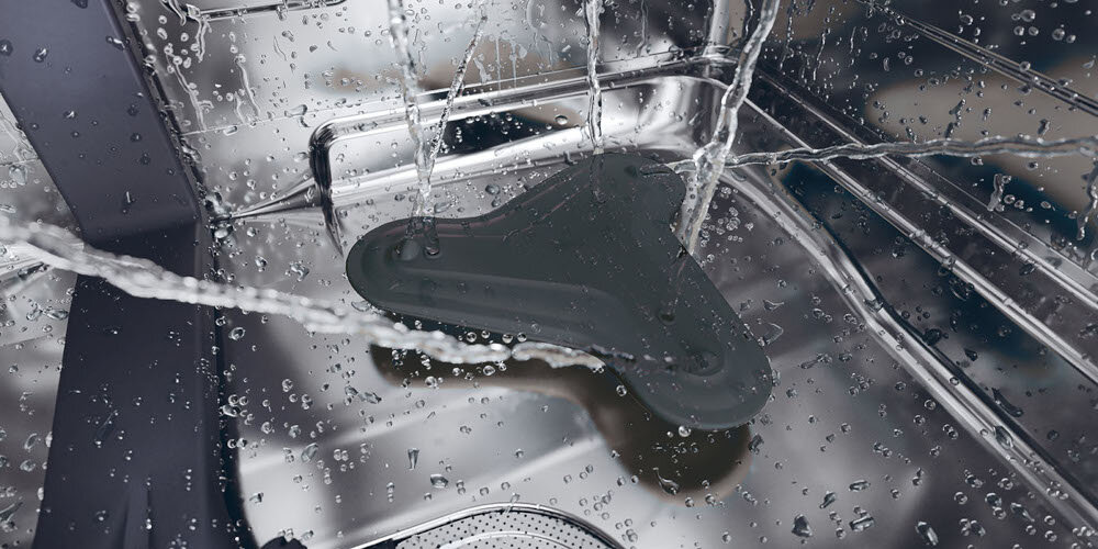 ZMYWARKA CANDY CS 6B4S1PMA wnętrze dno śmigło woda dodatkowe strumienie wody pozbycie się zabrudzeń Powerwash większy przepływ wody sześć strumieni