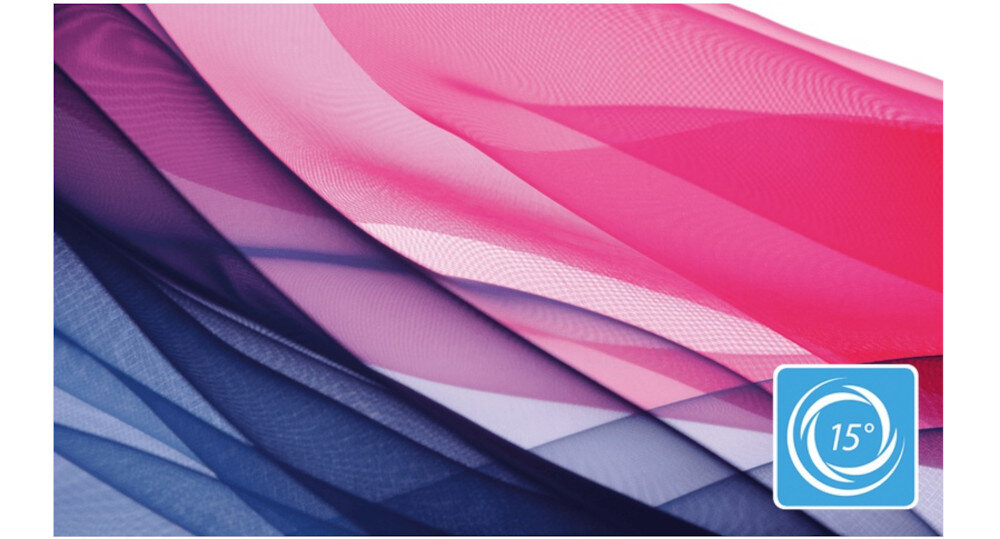 Obraz przedstawia kolorowe, półprzezroczyste tkaniny w odcieniach różu i niebieskiego. W prawym dolnym rogu znajduje się niebieska ikona z białym symbolem wiru i liczbą \'15°\'.